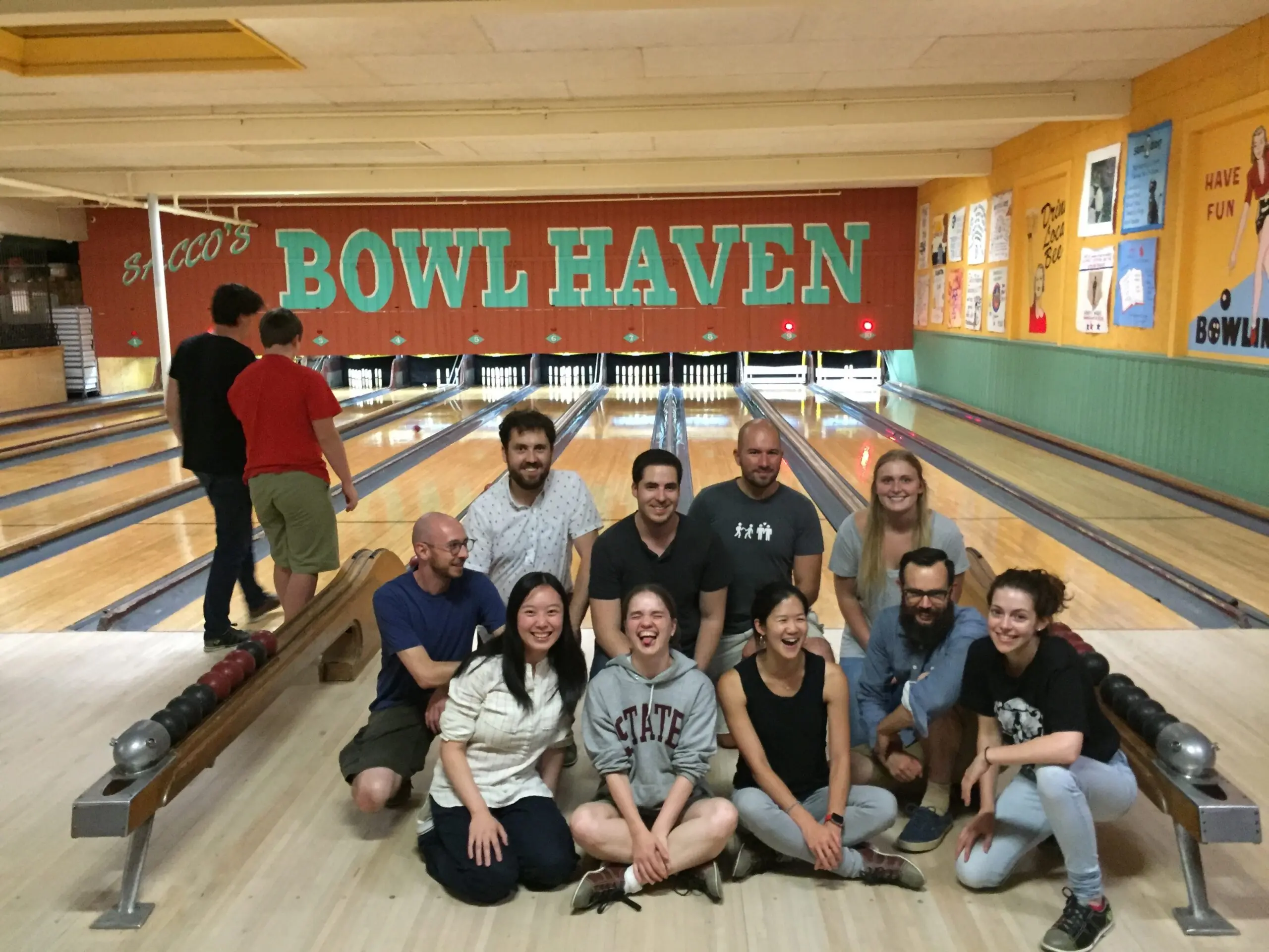 The lab celebrates their improved candlepin skills